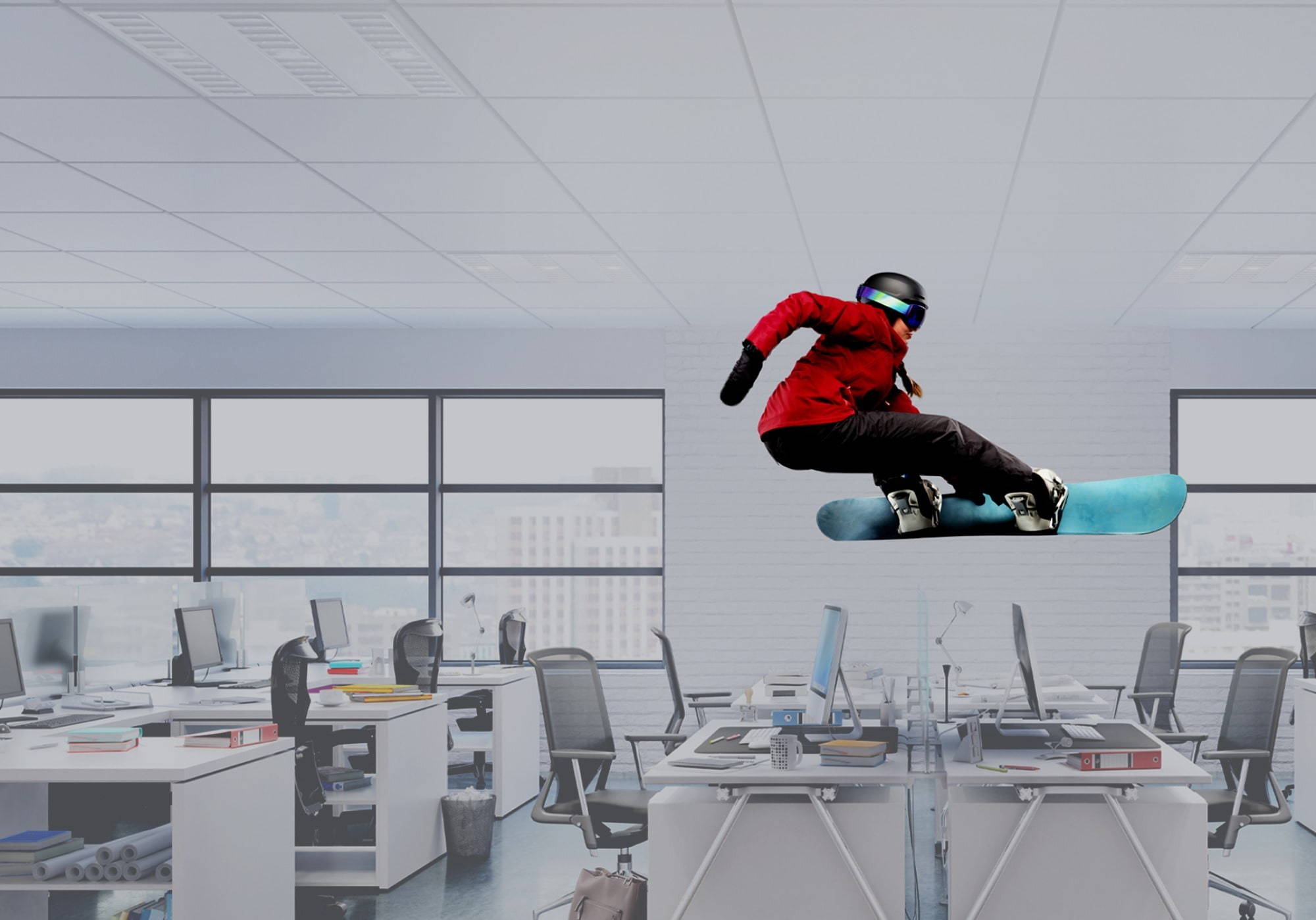 A man skiing in an office | IT jobs